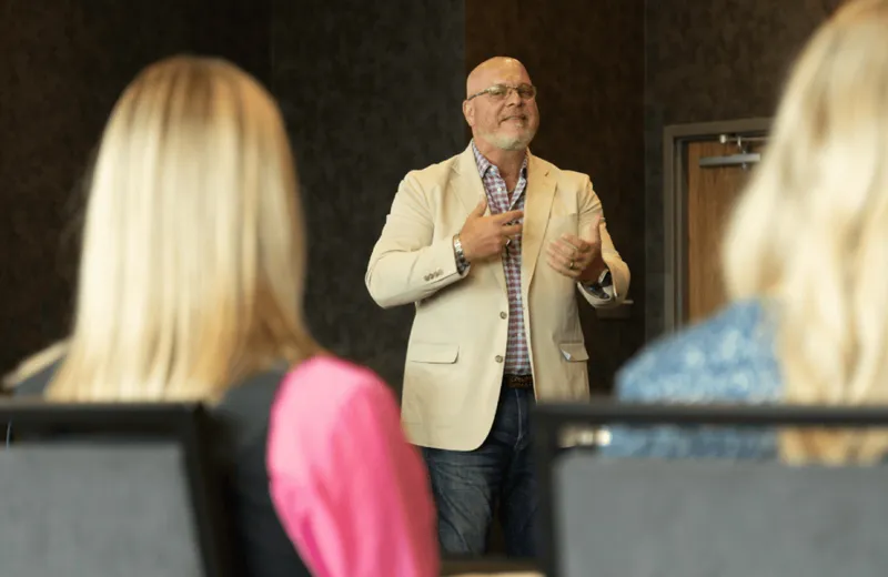 A speaker addressing an audience