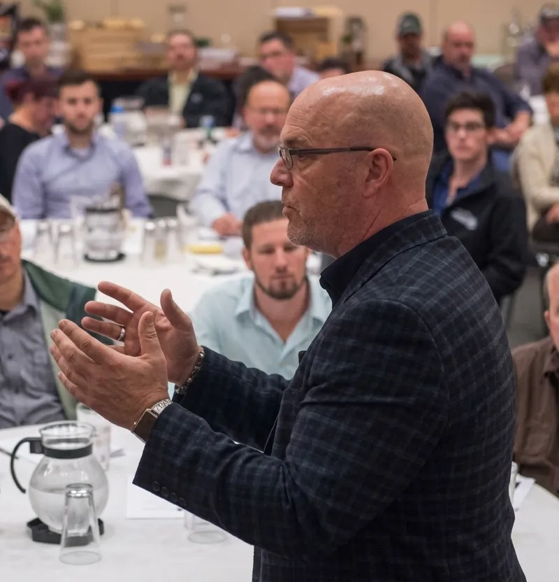 Dan McArthur working with a room of leaders